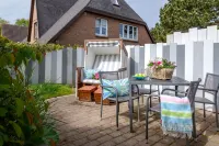 Cozy 1-room apartment with box-spring bed Hotels in Tinnum