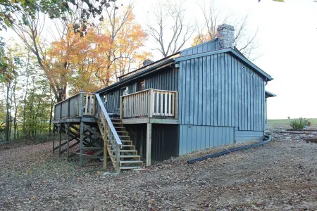 Rustic Retreat, a pre Civil War log cabin.