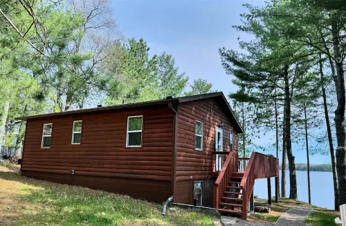 Escape to the Lake - Rustic 3-bedroom log-sided cabin nestled amongst the pines