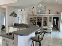RUM CAY GETAWAY: South facing waterfront home, private pool/spa, bar, and dock.