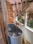 Bee Haven Bus at the RMR Farmstead with hot tub
