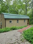 Pet friendly cottage on 17 acre Lake front property with dock and kayak access