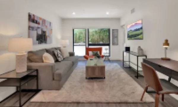 Pets Stay Free • Private Terrace • Elevator • King Beds • In-Unit W/D