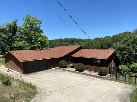 Amazing 5 bedroom, 4 bath home with Private Pool & Dock located in a great cove.