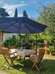 Apartment with View of the Tuscan Coast and Garden