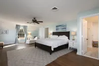 New! Gorgeous Waterfront Estate with Saltwater Pool, Beach and Dock