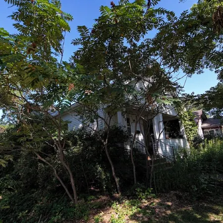 Bohemian 3-bedroom house with private yard in charming neighborhood