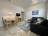 Vacation apartment "Kleine Möwe" with large garden in the heart of Pilsum