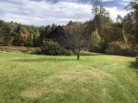 Restored historic farmhouse on 25 private acres