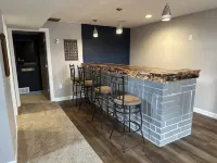NEW Three bedroom ranch style pet friendly home with a patio & theatre room!
