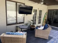 Close to beach! Family-sized home with pool and hot tub.