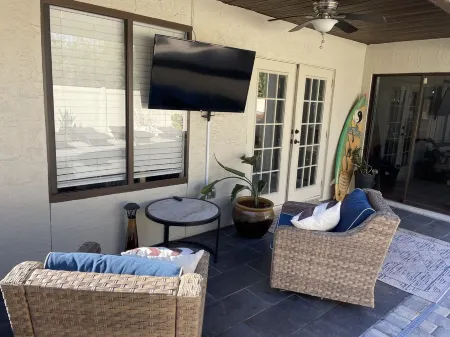 Close to beach! Family-sized home with pool and hot tub.