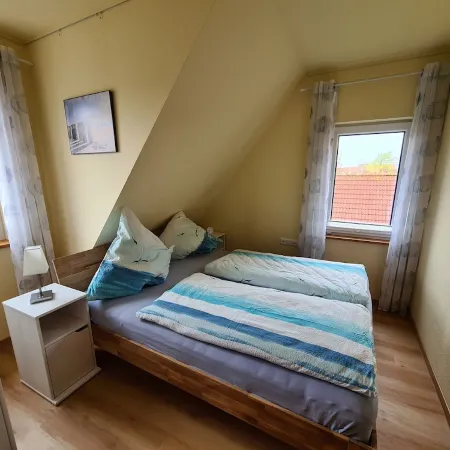 Apartment lighthouse at the sandy beach-balcony-2 double-bedroom-balcony-dogs on request