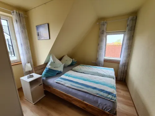 Apartment lighthouse at the sandy beach-balcony-2 double-bedroom-balcony-dogs on request
