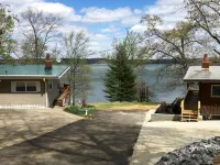 Experience Kentucky Lake out the back door! Spacious 4-bedroom retreat awaits. Hotels in Calloway County
