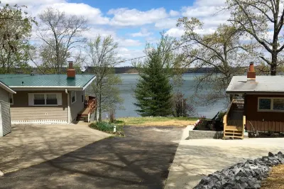 Experience Kentucky Lake out the back door! Spacious 4-bedroom retreat awaits.