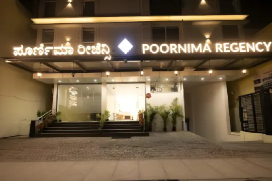 Poornima Regency Hotels near Lalbagh Botanical Garden