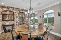 Castle on a hill, breathtaking views, surrounded with pools, trees, and lawn