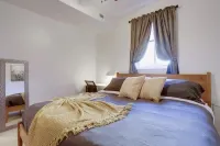 Stone Countertops and Stainless Steel Appliances - Stylish Modern Retreat Hotels in Columbia Heights