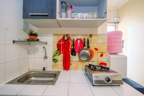Homey and Compact 2Br Cibubur Village Apartment - parking