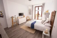 컴 투 세비야 스위트 델 아레날