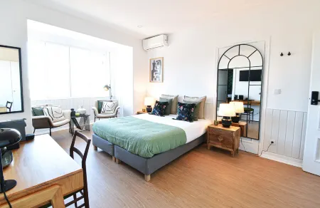 ArchiSuites Отели рядом с достопримечательностью «Baroque Library - University of Coimbra»