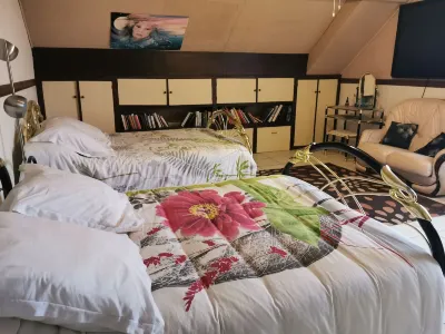 Au Jardin Fleuri Các khách sạn ở L'Absie