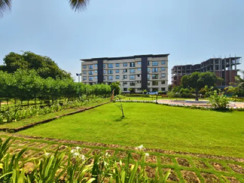 Konkan Pearl Suites Hotels near Devbag Beach