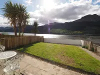 Situated in Lomond Park on the shore of Loch Long with amazing views