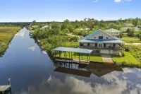 Majestic Waterfront home with so much to offer!