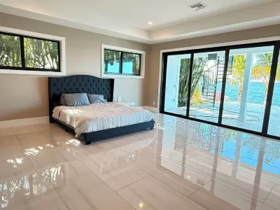 Riverfront 5 bedrooms, 5 baths , pool , spa , beach , dock and stunning views !