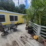 spacious 3 bed, 2 bath 2nd floor apt. w/ AC, Wi-Fi NOW ON SOLAR W/ BATTERY B/U