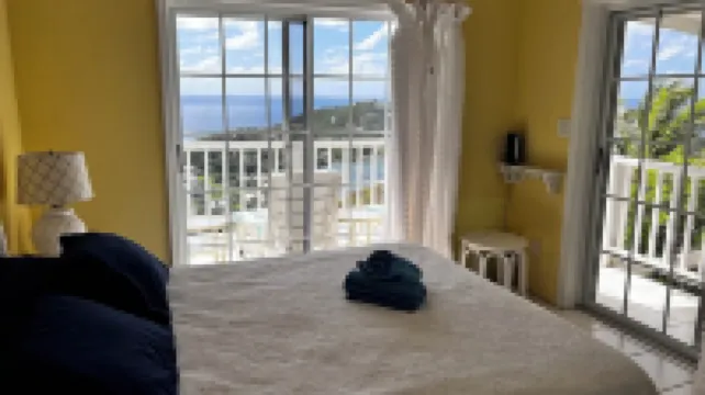 Cottage-like West Indie town house.  Perfect for two couples or a family! Hotels in 