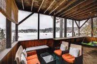 Porch and Views Queensbury Three Family Lakehouse - 3-Star