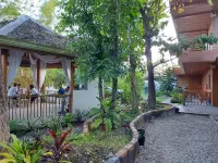 New Village Lodge Hotel dekat Tumalog Falls