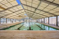 Sparkling Community Pools and Screened-in Balcony - Exquisite Paradise Retreat
