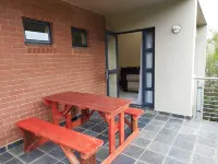 Apartment with Lush green garden and a Pool