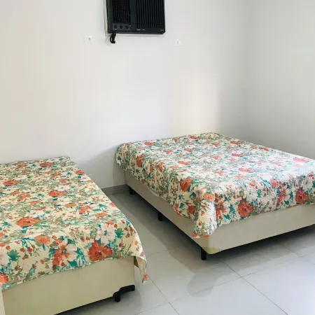 Charming 2-bedroom apartment in terrific Vila Julia Guarujá with AC