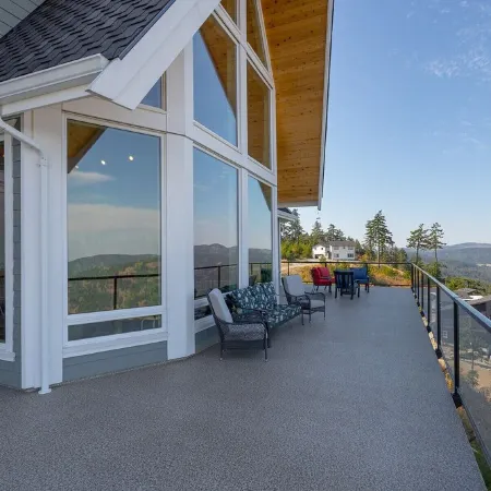 'Above It All'  a spacious sundrenched house with expansive deck and Epic views.