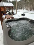 Cozy Riverfront cabin with hot tub!