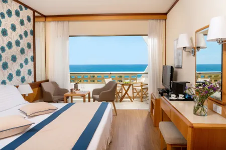 Constantinou Bros Athena Royal Beach Hotel Отели в г. Героскипу