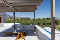 Mikro Livadi Special Lodges - Has an Eco Salt Water Pool - 150m from the Beach Hotels in Petres