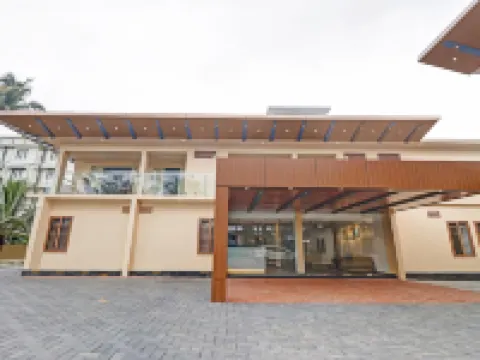 Treebo Grand Vistara Airport Suites Hotels in Ernakulam