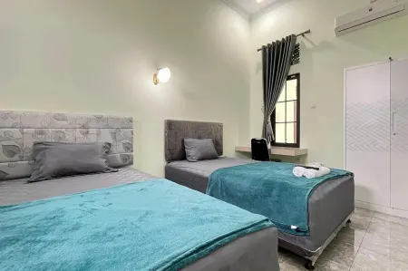 Trubus Guesthouse Syariah Magelang Mitra RedDoorz Отели в г. Mertoyudan