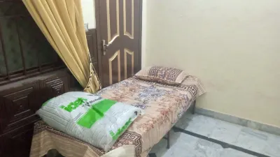 ROOM 10 Serene Retreat in Rawalpindi - Your Home Away from Home 2