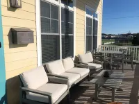 Beachfront - unbeatable location - steps to beach & shops - sunsets from porch!