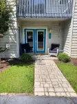 New Listing!  Ground Floor, Elegant 2 Bedroom Condo minutes from the beach.