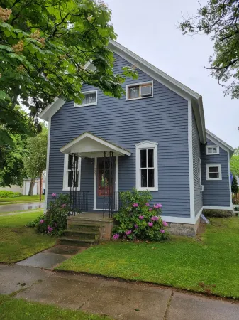 4 BEDROOM HOME IN MANISTEE MI.  Walk to the Lake! Deck!