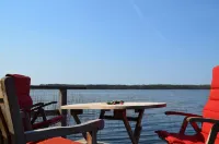 Very quiet 7500m² lake plot, own jetty