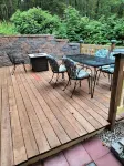 Beautiful cabin situated on wooded land with nice yard clearing and small stream